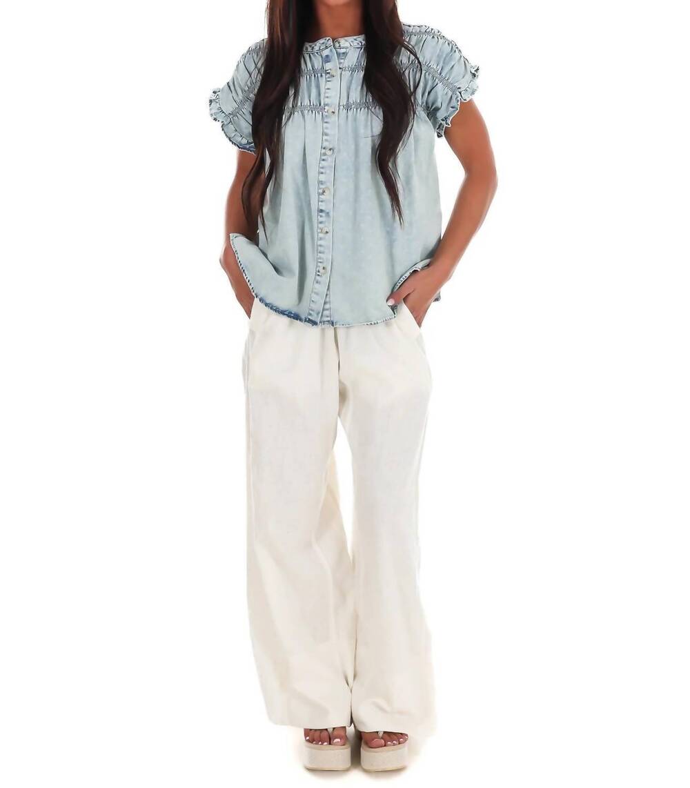 NEW SUNDAY EDITION soft skies ruffle top in light denim